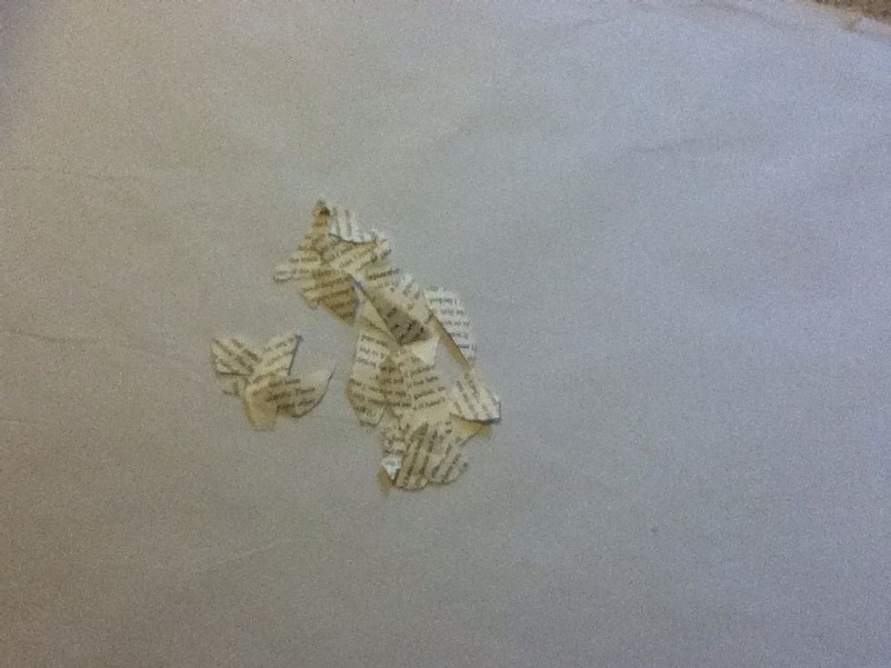 This is just a suggestion, but if you have a book, tear out some pieces.