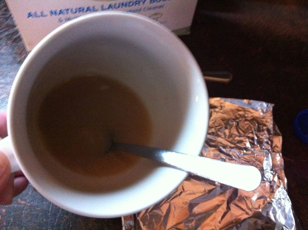 This is leftover grease from cooking bacon. Ants love this stuff! I pour in coffee cup and keep in fridge covered in foil.