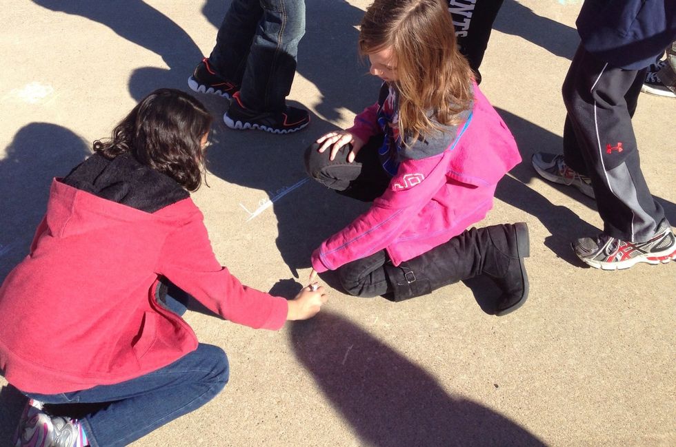 This is me and my shadow experiment where we measured the length of our shadows as Earth moved around the sun. Our shadows go around us. We measured every hour