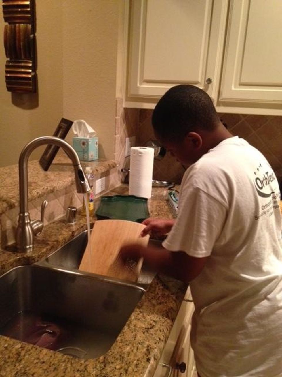 This is me cleaning the cutting board.
