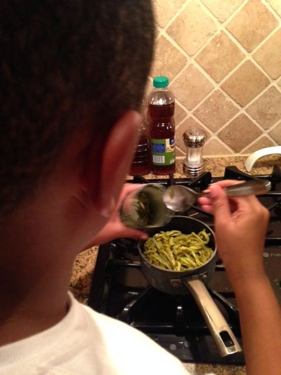 This is me cooking  green beans as my side dish.