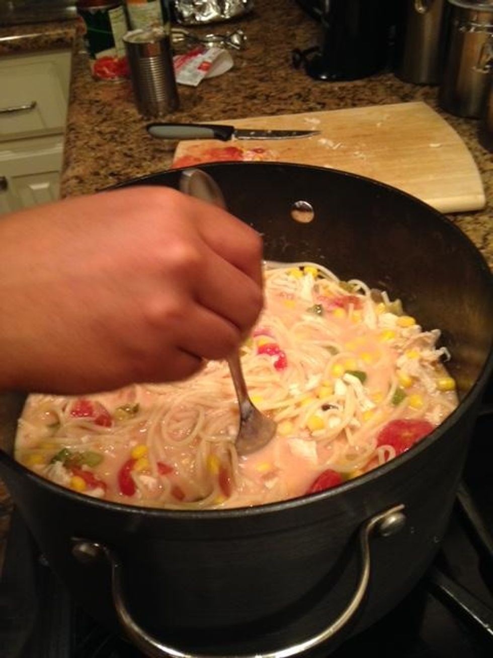This is me stirring my spaghetti before putting it in the oven.