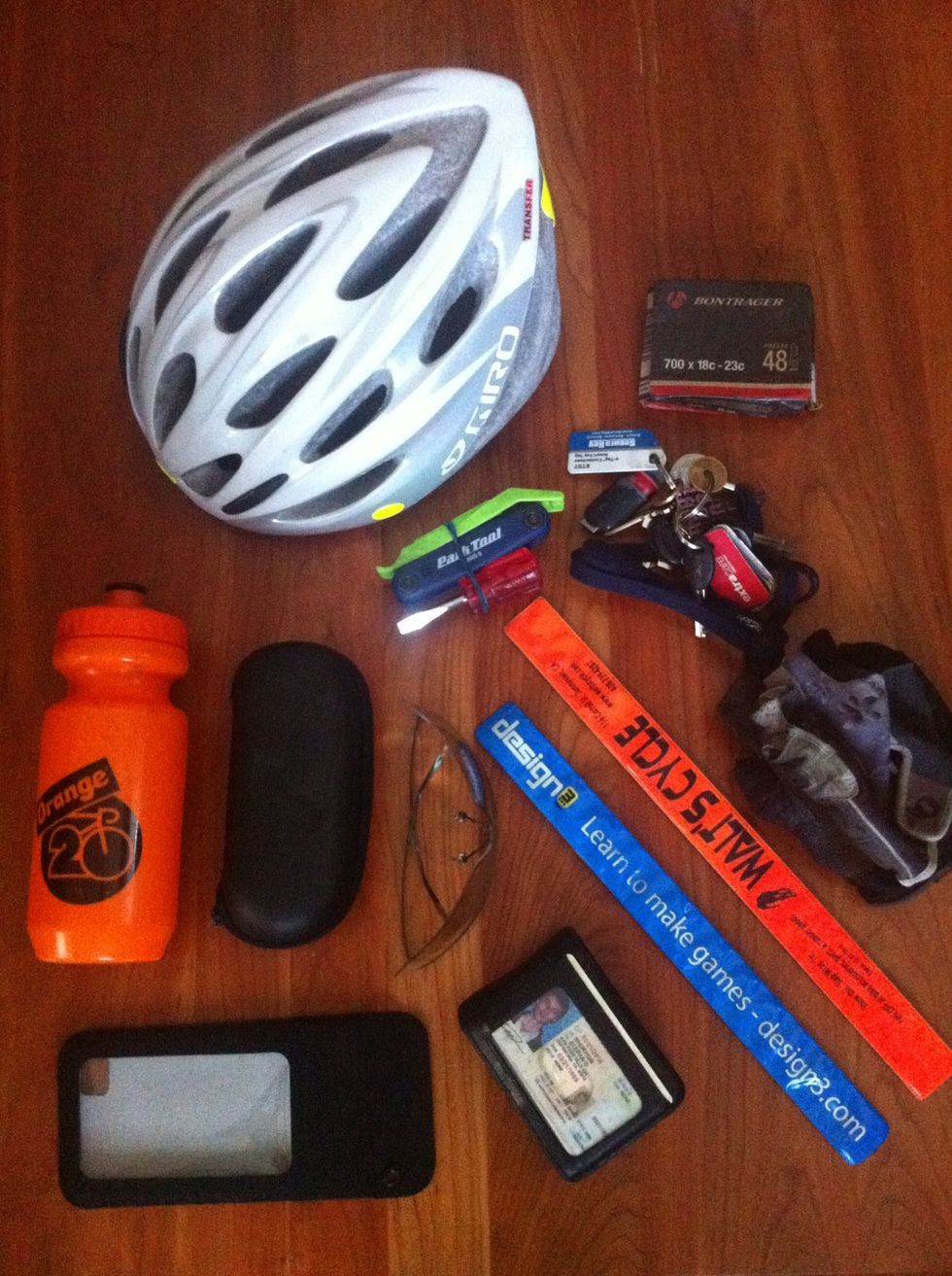 This is most of the gear I take with me every day. Important in this picture are: wallet, keys, eye protection, cellphone with case and most importantly two correct tyre tubes that fit your wheels.