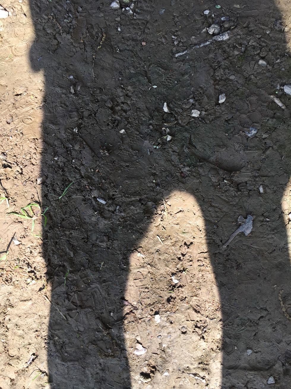 This is mud and it is an example of weathering because rain wore down the soil and turned it into mud.