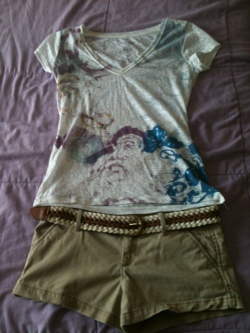 This is my casual look.. Pattern or brand shirt with neutral shorts and little to no accesoies