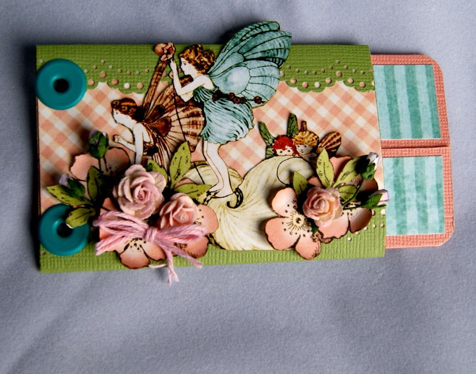 This is my cover image. I incorporated paper roses and bakers twine