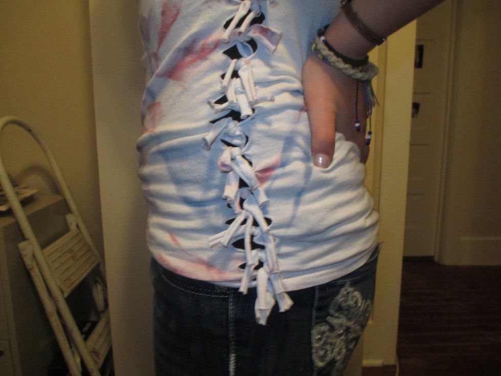 This is my favorite craft to do. When you wear it, you will get a lot of compliments. So take those old, baggy t-shirts and turn them into a fun and creative tie shirt.