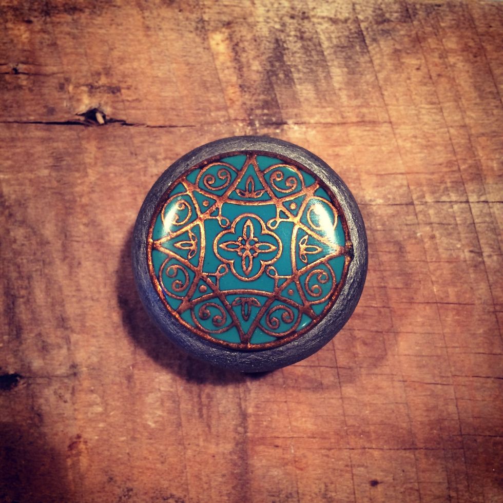 This is my favourite using an old pendant... I used black, grey & silver paint then adhered the pendant on top of the pull. Love it!