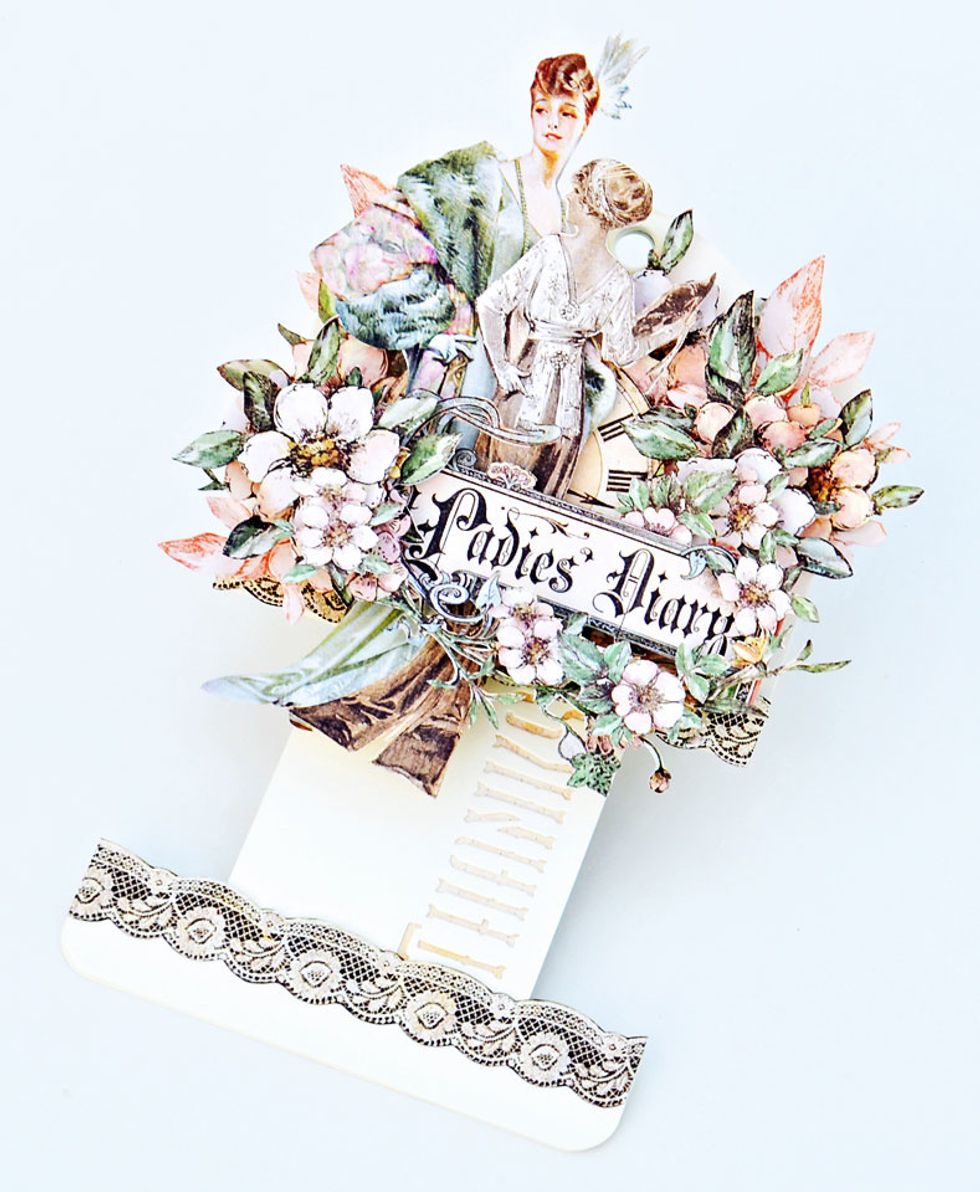This is my finished pull out tag card. I chose to embellish with Graphic 45 Ladies Diary Collection.