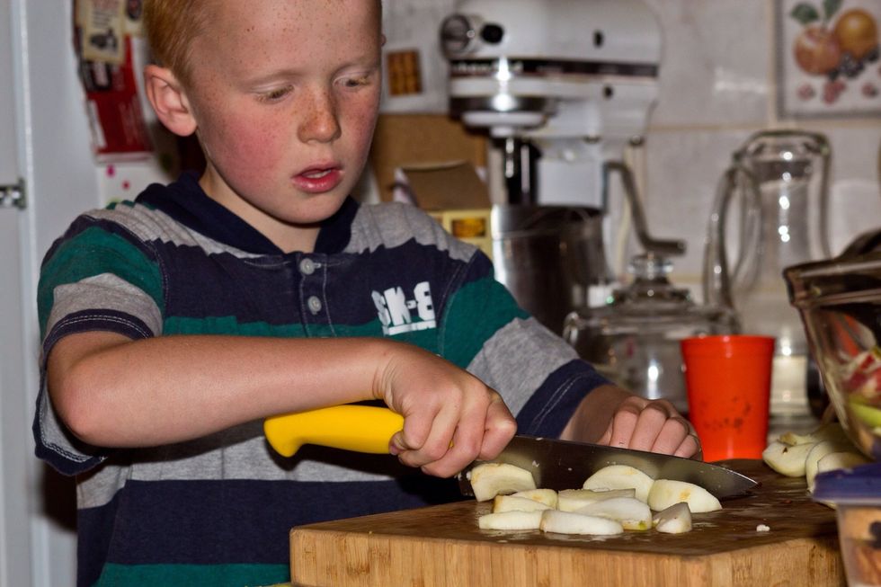 This is my focus face, I was paying very very close attention to cut the apples and not my fingers.