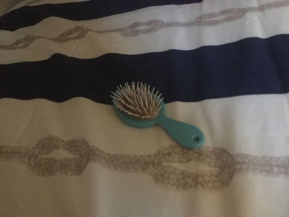 This is my hair brush if u have a bed side table than put it there