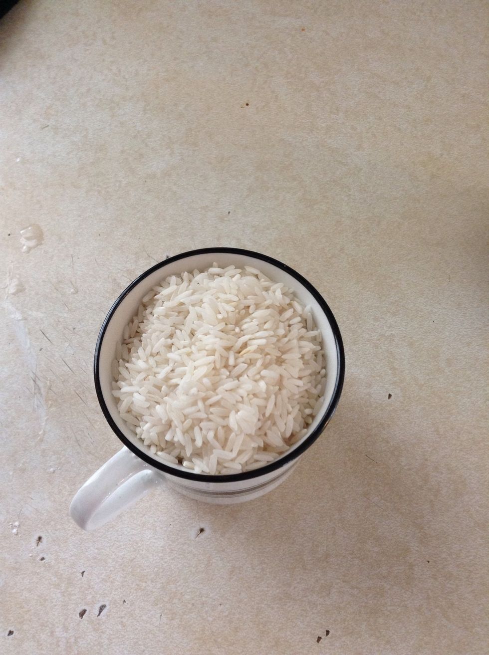 This is my measuring cup :) ...add rice