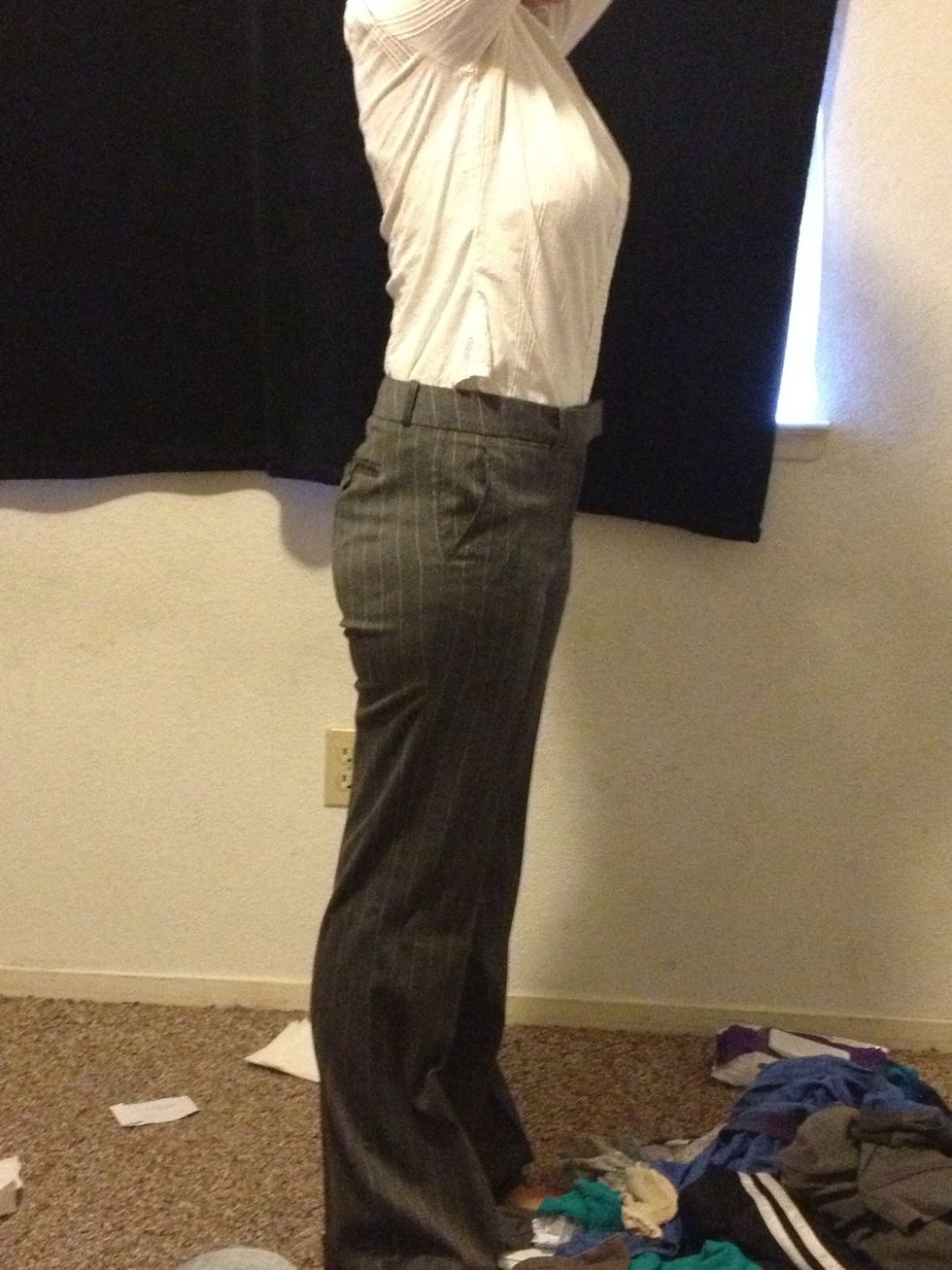 This is my only white shirt. See how it un tucks? Yes I do raise my hands over me head at work. I also file stuff so after I'm crouched down and then stand up. Re-tuck.