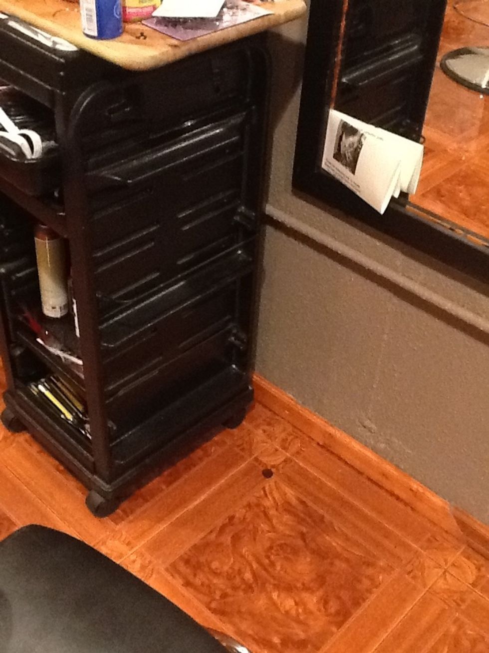 This is my station. I put a wooden cutting board on top to give me more working space & to be able to sit my irons on it. Cart $80, Sally's. board, $10, Walmart.