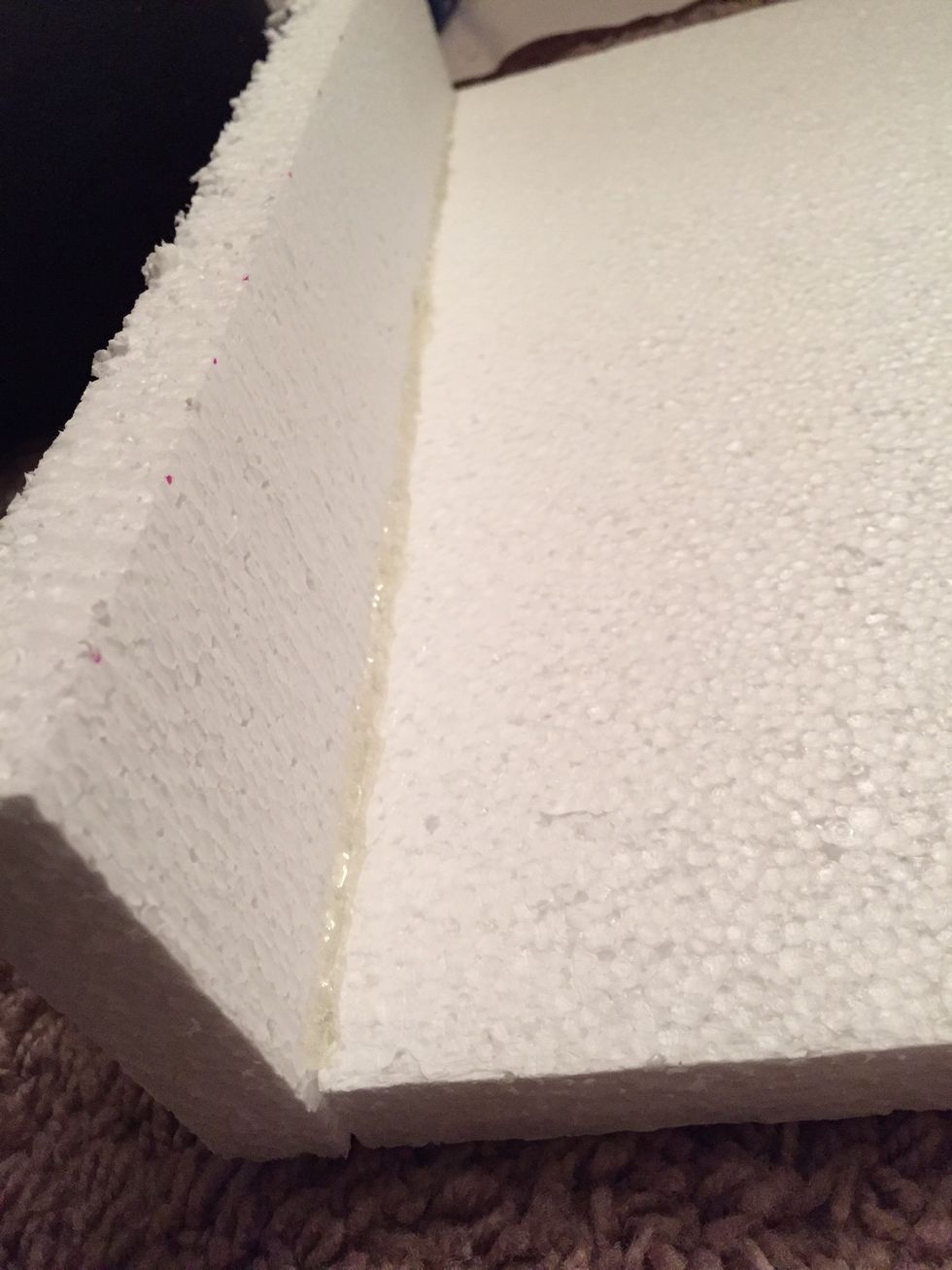 This is optional, my other valences were smaller than the actual length of the precut boards and didn't need this, but add if you want the extra support. Once nailed, add a strip of hot glue.