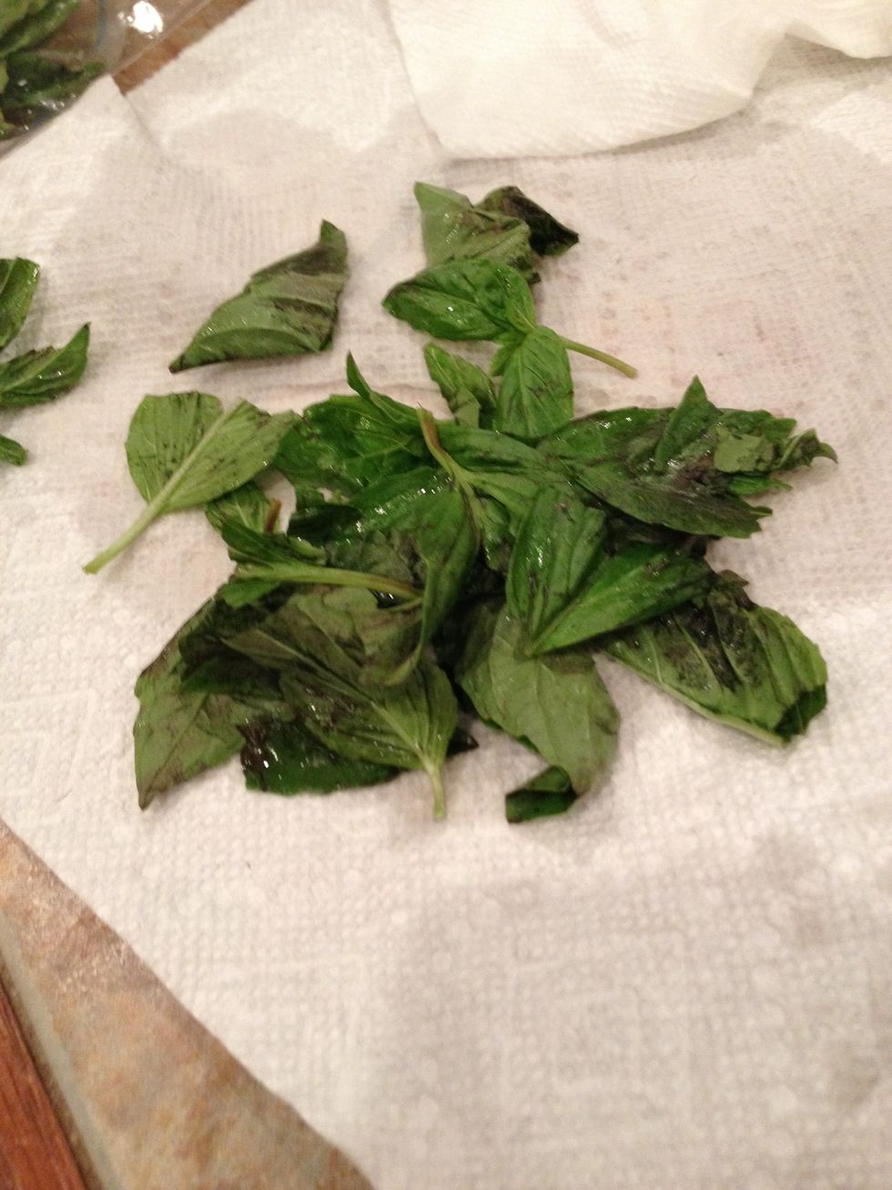 (This is optional) tear the basil till little pieces