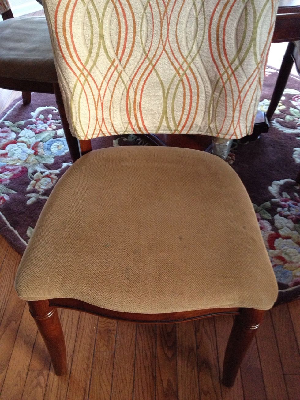 This is our 7 year old dining chair . Flat and old.