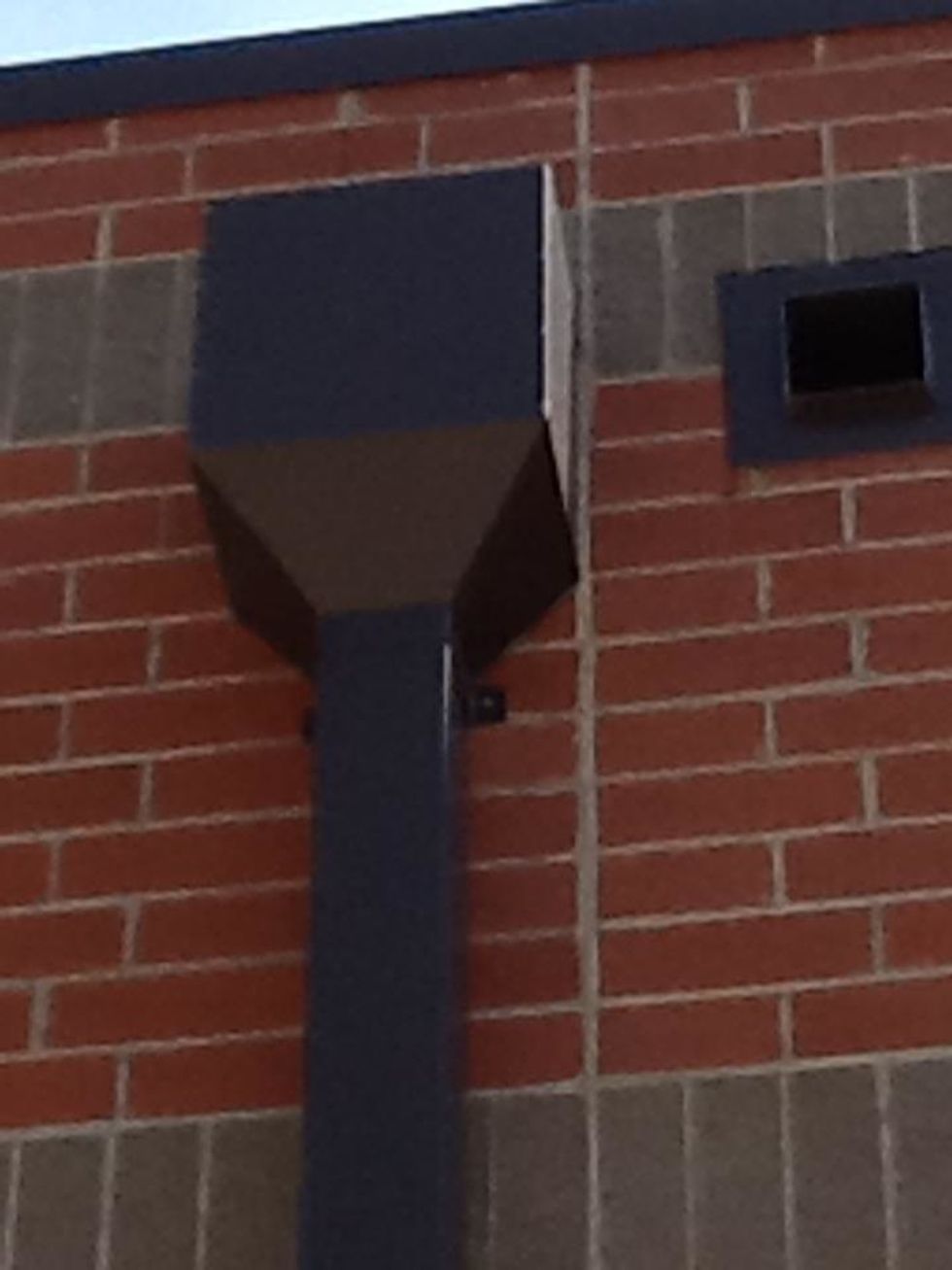 This is part of where the drain flows in the front of the school. It represents a hexagon because it has 6 sides.