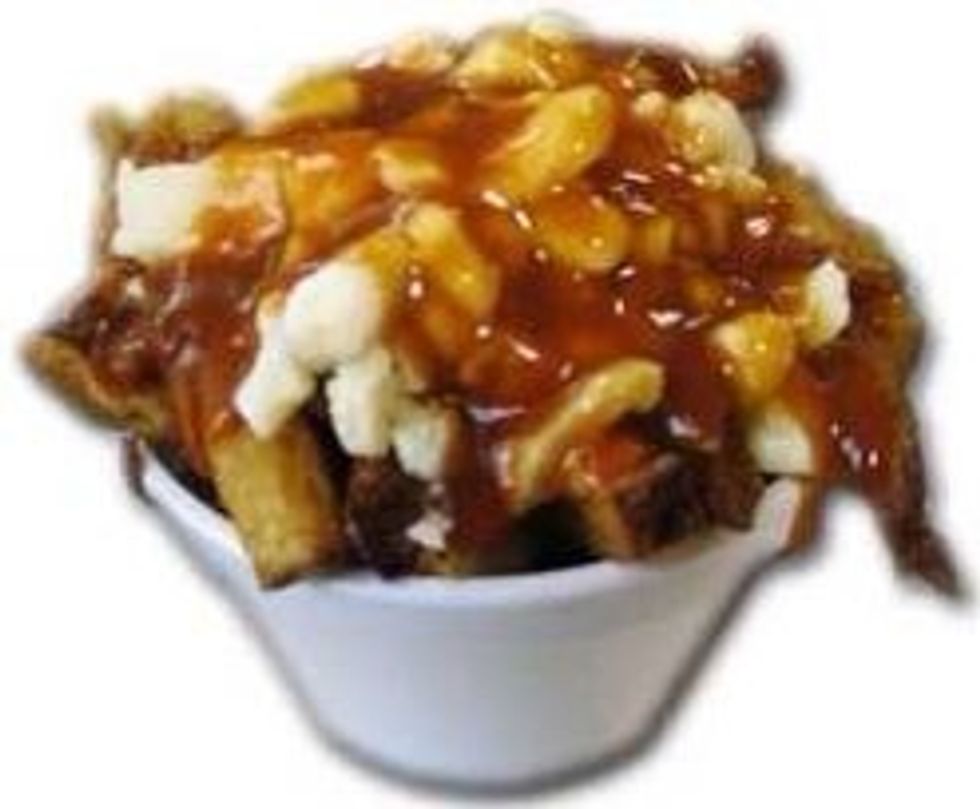 This is poutine... It is the most disgustingly delicious thing you will ever eat. It consists if French fries, gravy and cheese. You are always 3 steps away from a heart attack after eating this.