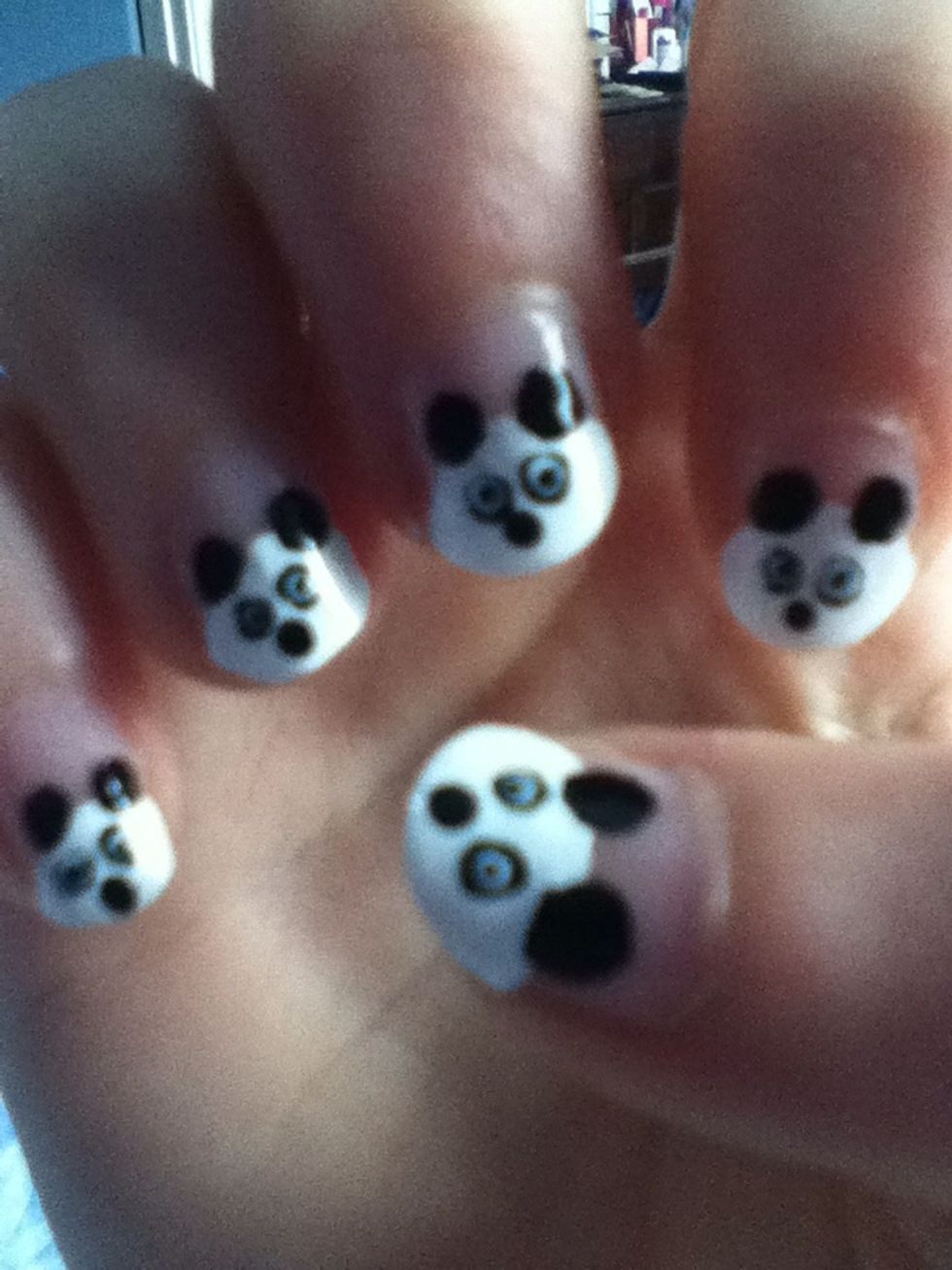 This is probably the hardest part. Put a small black spot in the eyes. If this goes wrong then you can put white over the top of it and start again on this step.