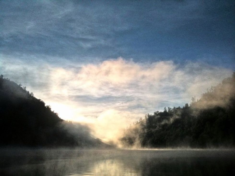 This is Ranu Kumbolo lake looks like in early morning. This lake is located in Mt. Semeru, Tengger, East Java. It is the highest mountain in Java, it has beautiful scenery, specially on its peak.