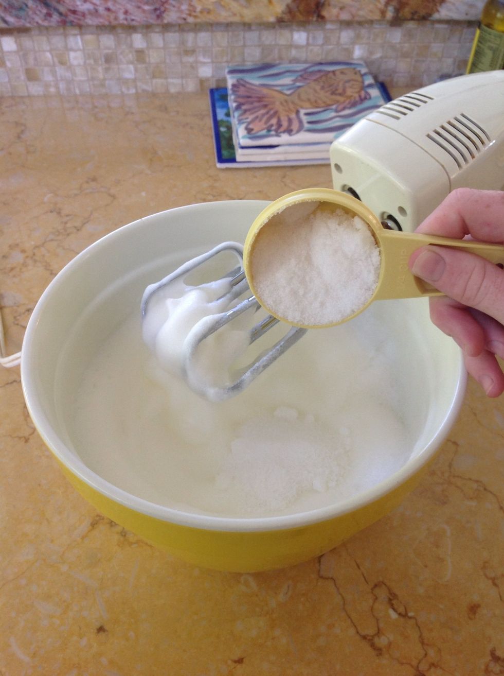 (This is soft peak) Once at soft peak, slowly add the 1/4 cup of the sugar and beat until stiff, glossy peaks form.