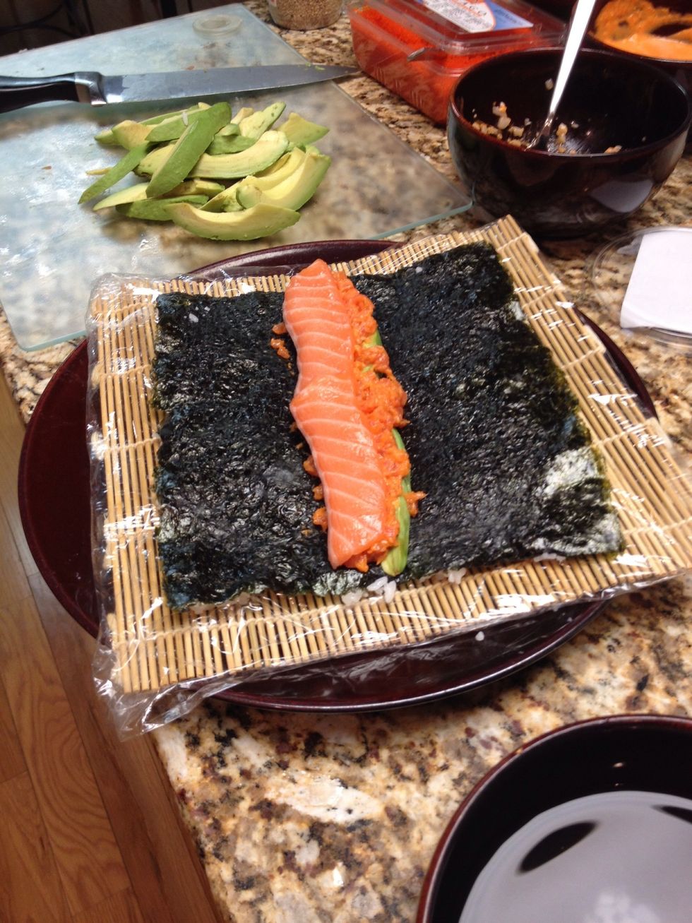 This is spicy tuna with avocado and salmon