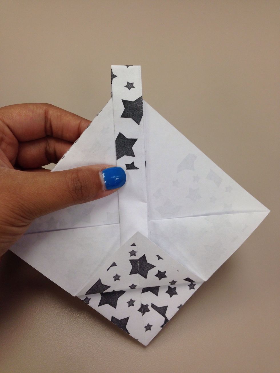 This is step a/ step 11. Insert the handle at this step and continue with the steps