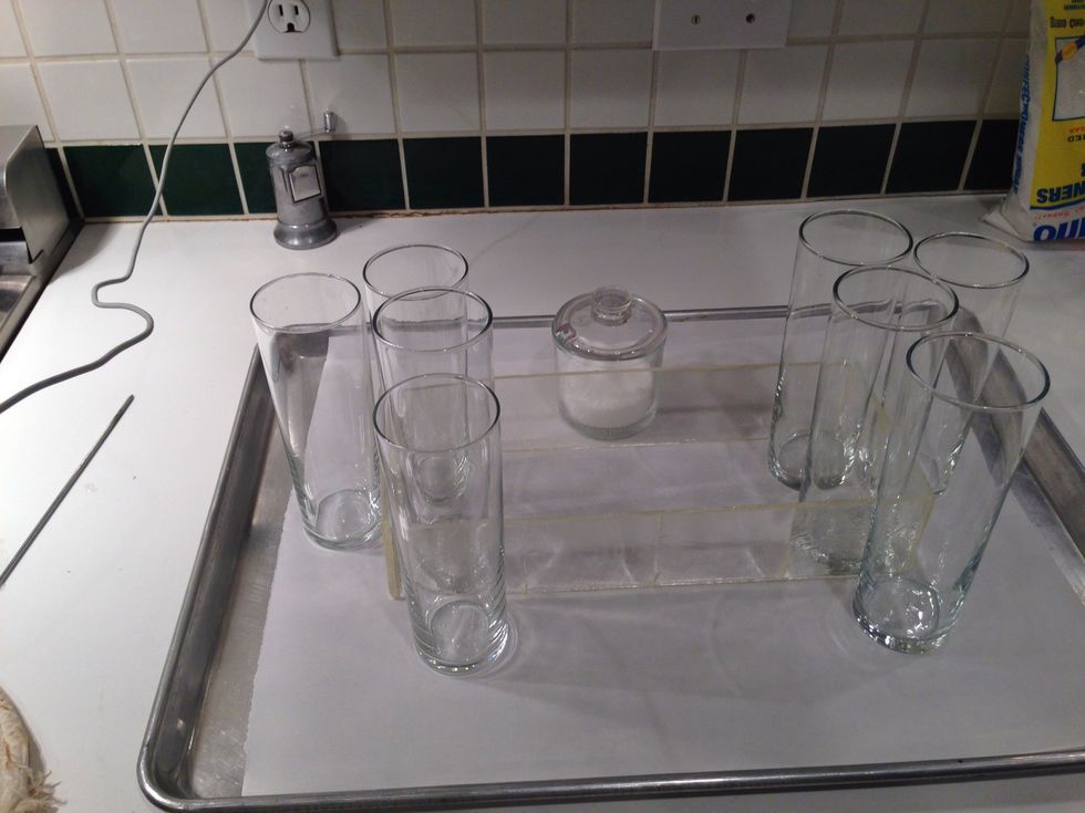 This is the best part. To put the glass together, Throckmorton propped the pieces up just so. All the glasses will hold it together once we figure out the next step. We need glue...