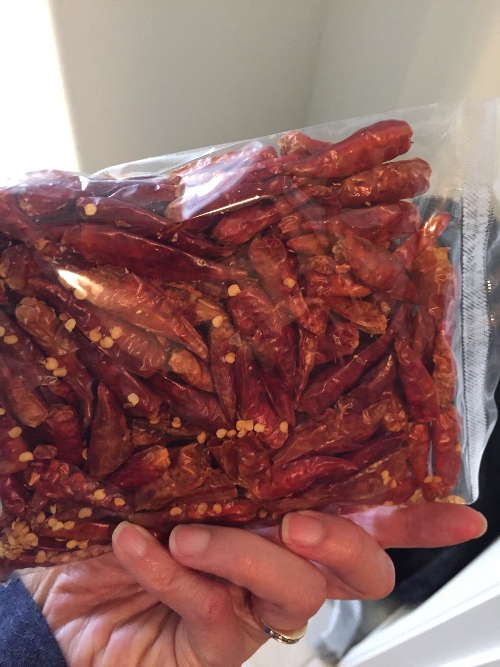 This is the chili peppers you want to grind up, possibly in food processor or coffee grinder