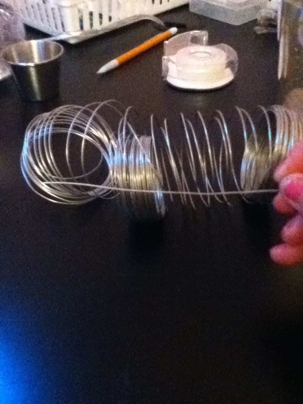 This is the craft wire you need. That piece below is the size you need to cut (about four or five inches).