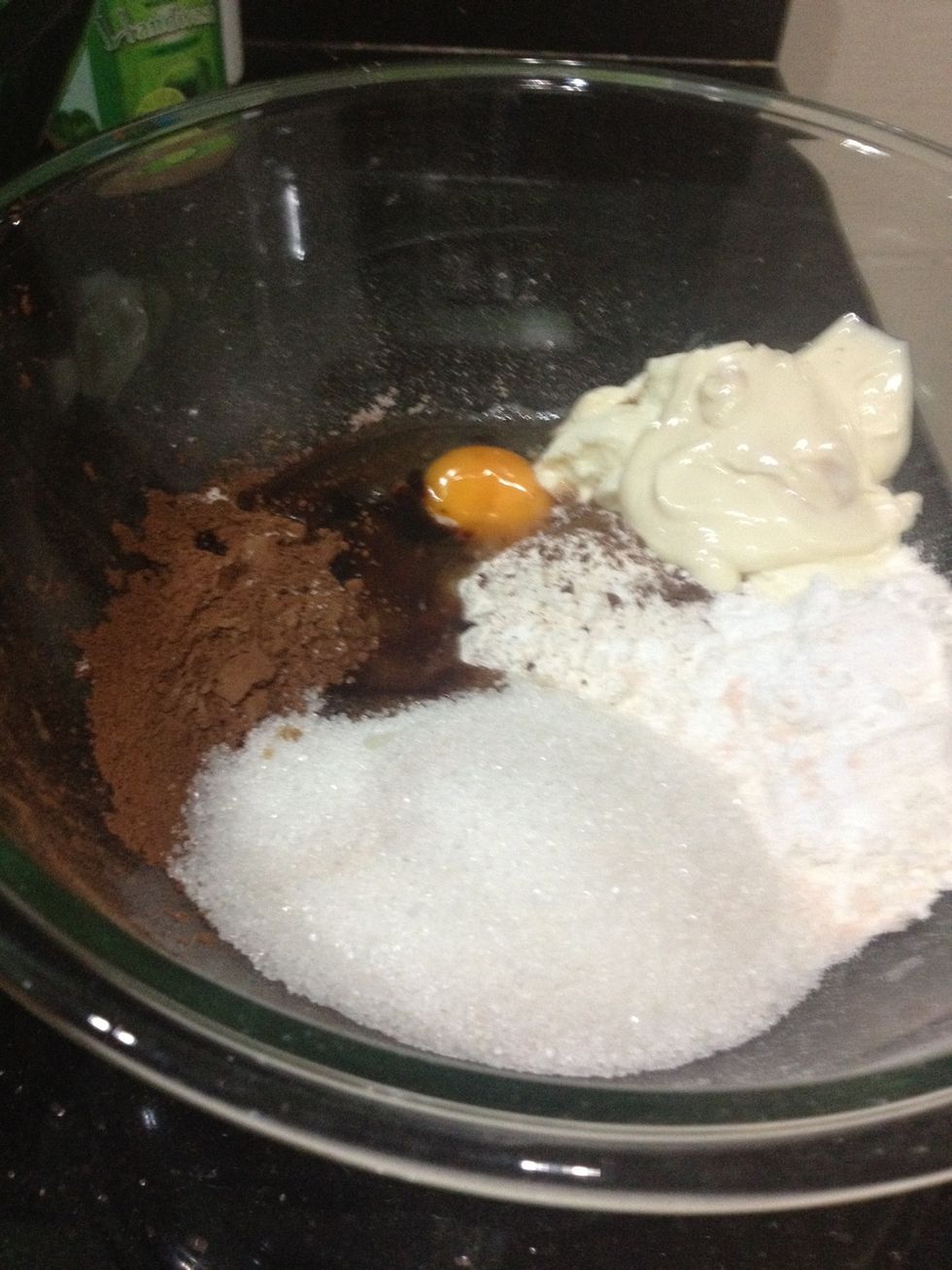 This is the easiest recipe ever. Just mix everything in a bowl, except for the coffee and chopped chocolate. Mix only till its incorporated. It will be quite tough and dough-like.