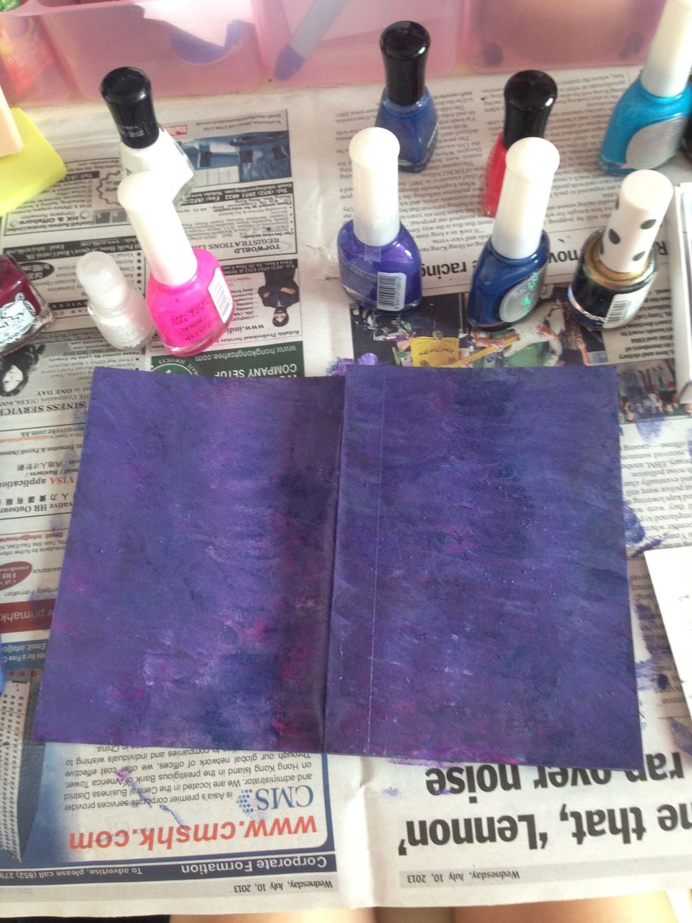 This is the final product! You can use your white paint / nail polish and make little stars. Leave your notebook to dry overnight. If you don't like your final product, just paint over your old design