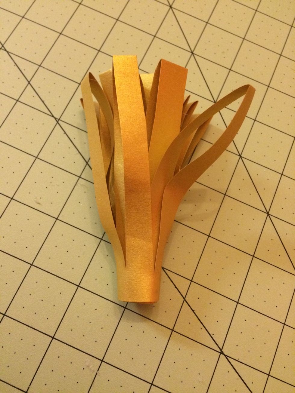 This is the finished look. Hot glue the bottom of your stem and place at the center of the flower bowl