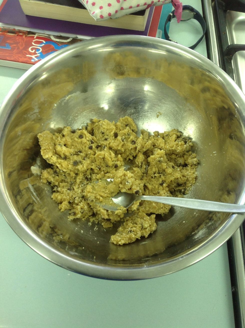 This is the finished mixture. Get some on the spoon and squeeze together to make sure the mixtures right. If it crumbles, the mixture is too dry