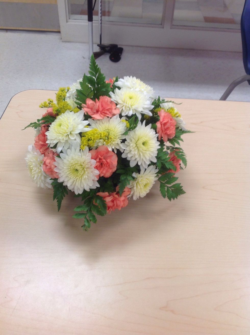 This is the finished product (round mound). In order to excel at this arrangement, your arrangement should look round. Your goal should be to achieve proportion. I am very satisfied with my results.