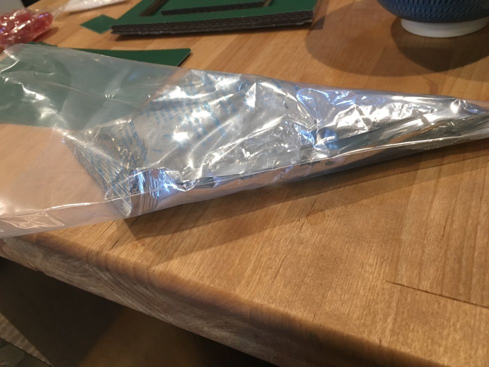 This is the frosting. Put it in the clear bag thingy they give you.