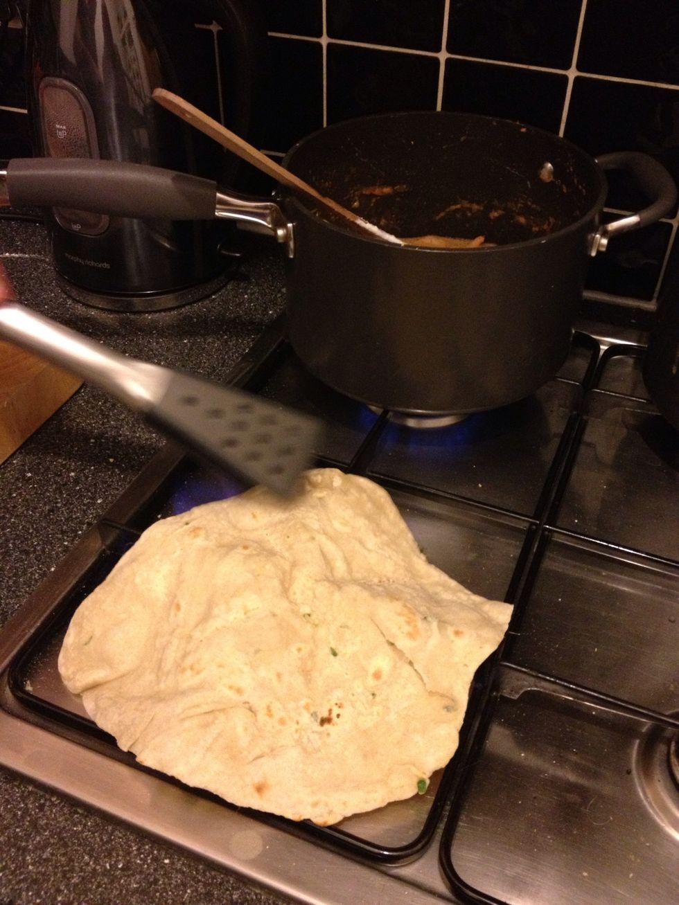 This is the fun bit!! Move pan off heat and put chapatti directly onto gas flame! For literally seconds it will start to bubble.