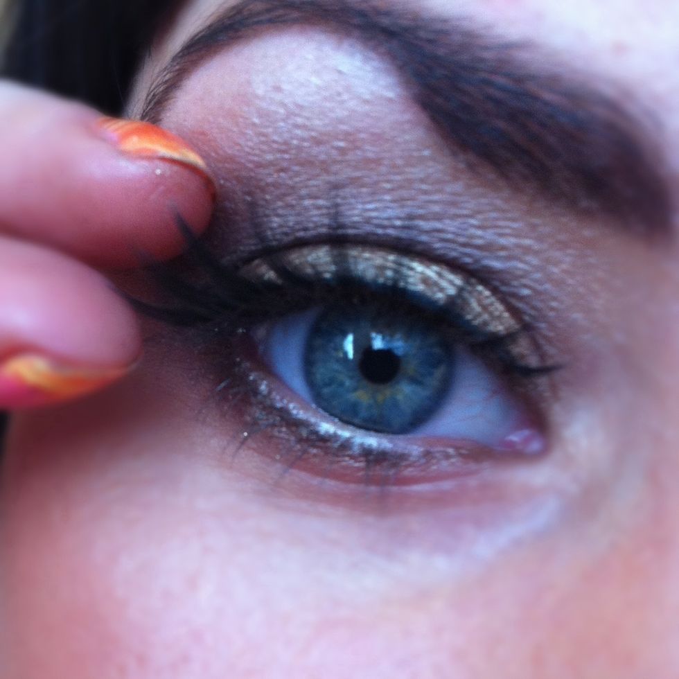 This is the fun part! Eyelashes. Cut to your eye shape, flex them and then apply the glue to the strip. Let this go tacky for a few seconds and then apply to your root of your lashes.