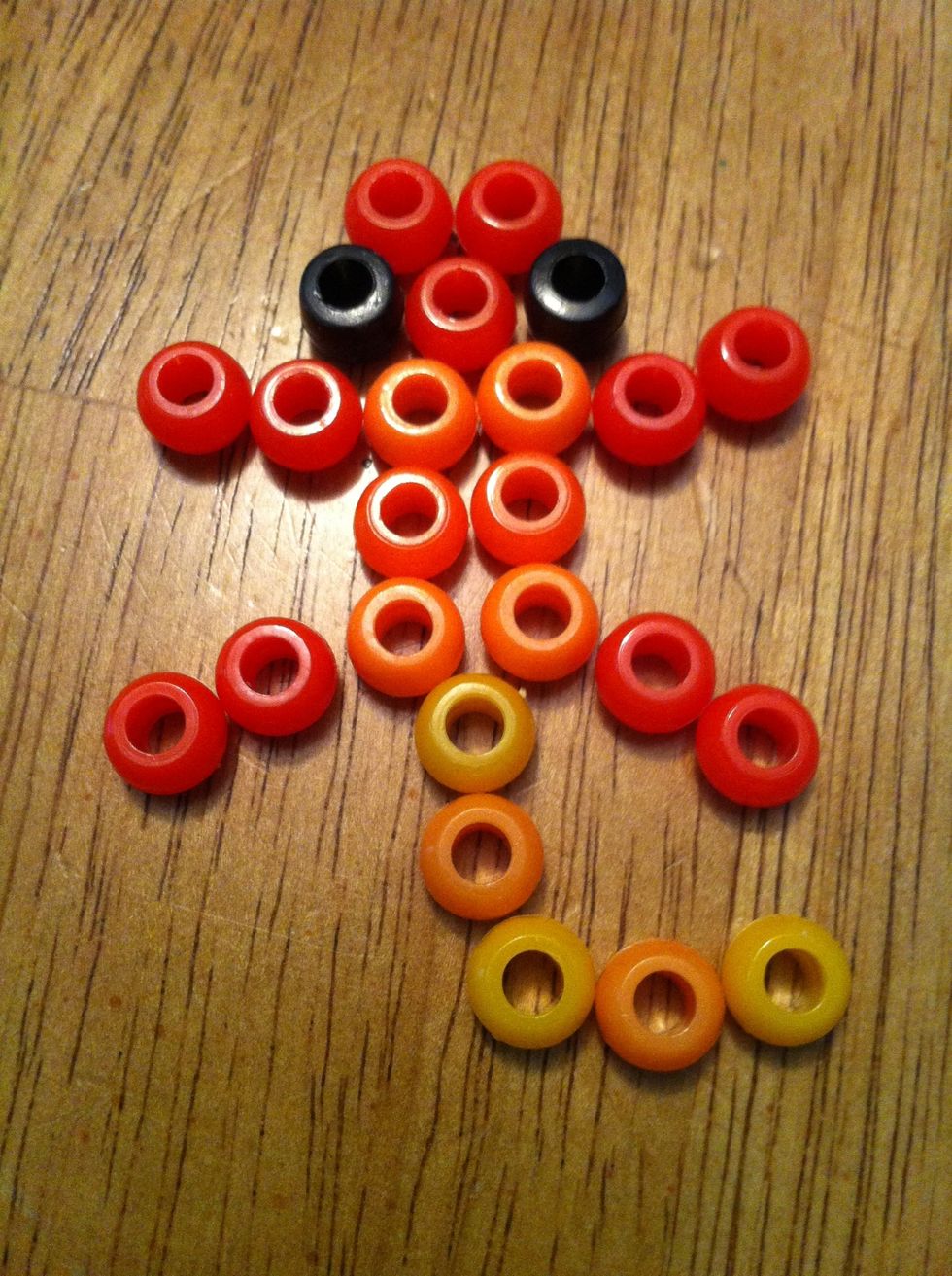 This is the gecko design. You do not have to use the same colour. Pick your colours and place them in this shape/design. But defiantly have black for the eyes.