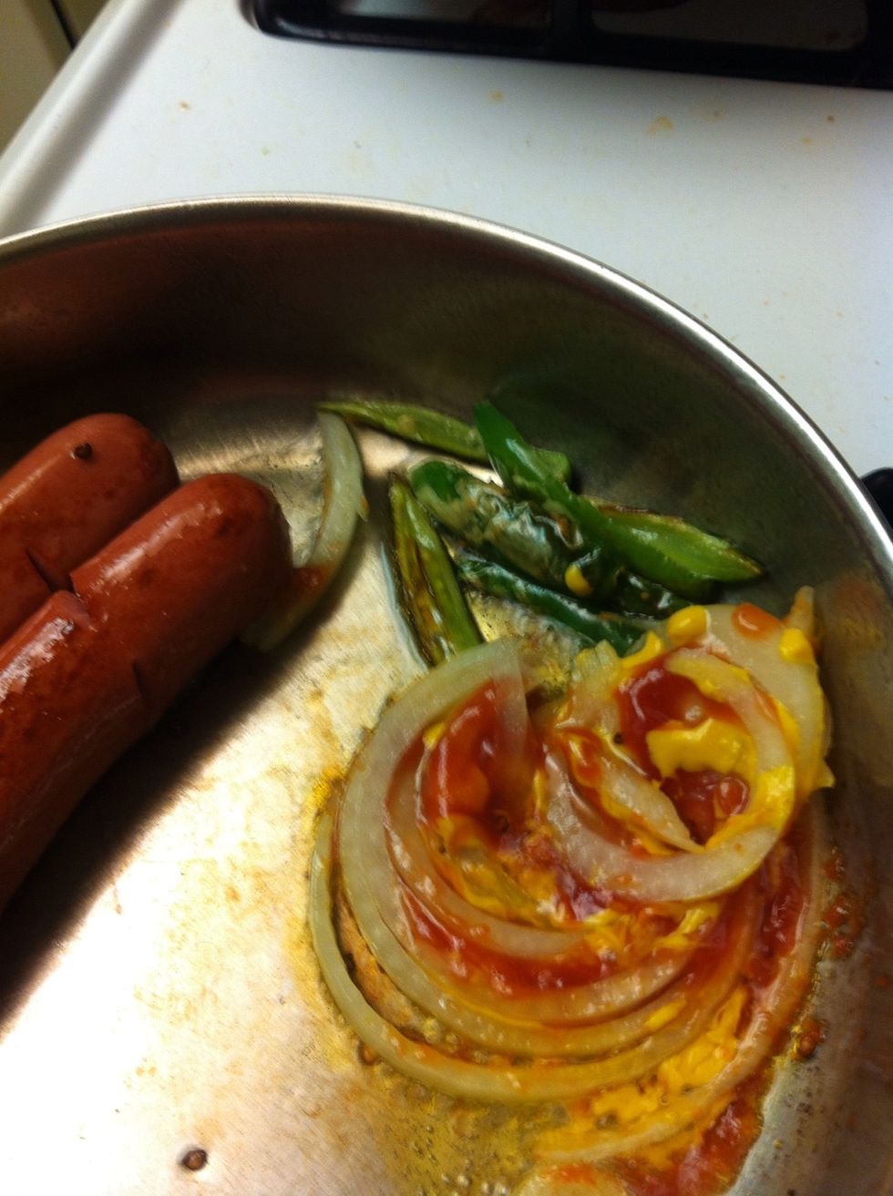 THIS IS THE IMPORTANT PART OF THIS STYLE OF HOT DOG: The trick is to grill the onions with Ketchup and Mustard!!! You'll start to smell beautiful L.A. ;)