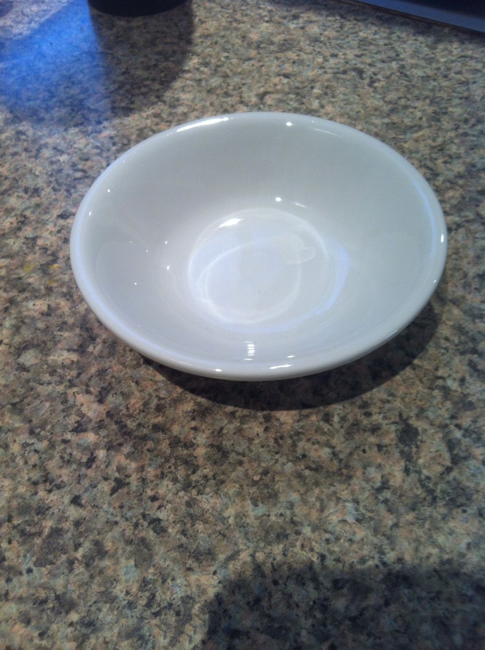 This is the key: the perfect egg cooking dish. If you don't have the correct dish, find it! Mine is shallow, ceramic and about the same size as a bagel. Make sure it is microwaveable.