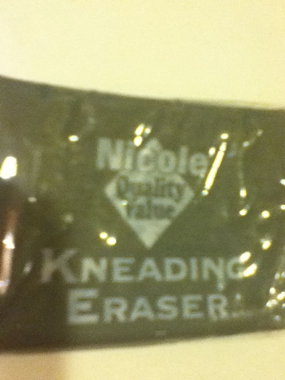 This is the knead eraser that I used to do highlights and touchups!