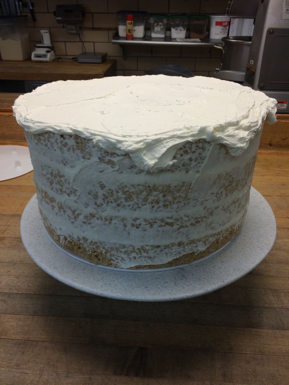 This is the middle section, it consisted of 4 -12 layers of rice Krispy "cakes".  It's being frosted with butter cream and will draped with a rolled yellow fondant.