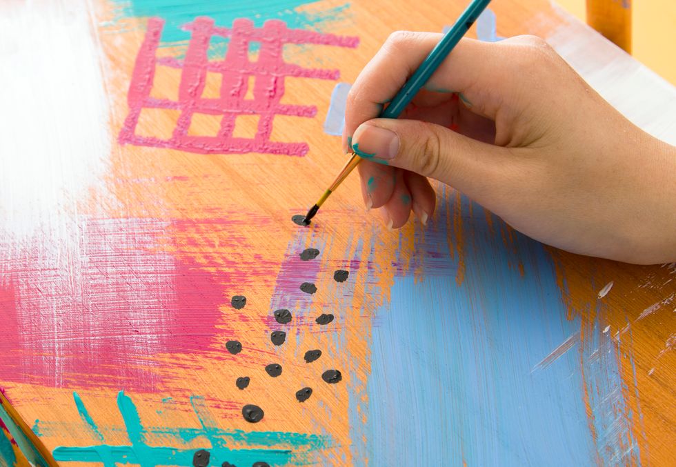 This is the one case where a solid color works better than many color. Paint patterns on the top and the handles.