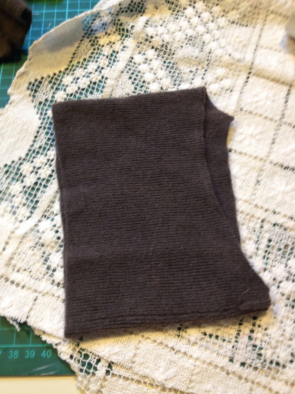This is the only part left of a sweater that got ruined by being washed on too high temperature. It is the turtle neck and I'm going to make a bracelet out of it.