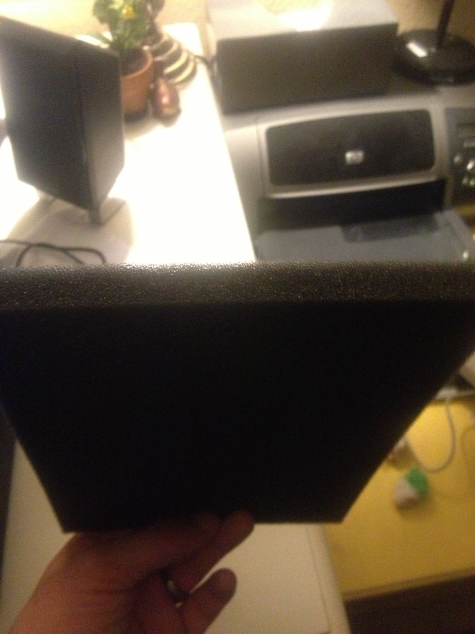 This is the padding at the bottom of the case. You can either keep it or get rid of it.