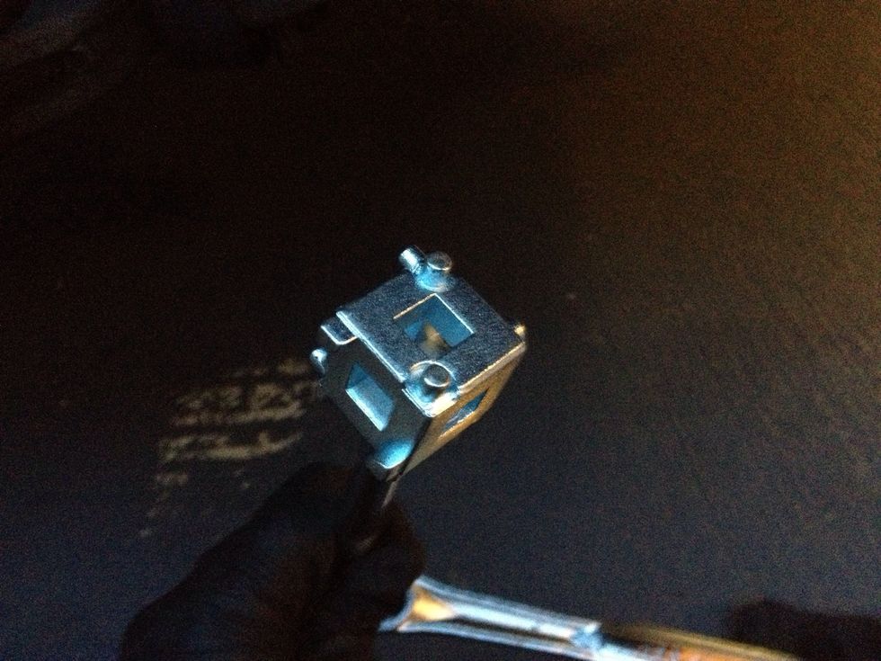 This is the piston tool to turn the piston back in. Before you start, take the cover off on the brake fluid reservoir, then use your ratchet to tighten