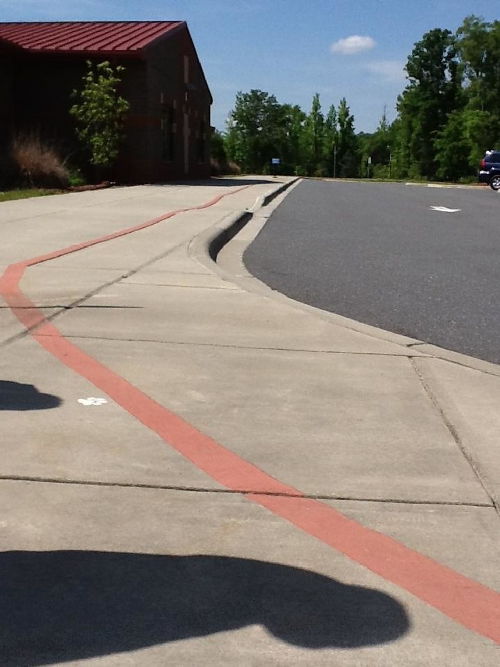This is the red line for the car riders in the car rider line. This represents a line because it keeps going on forever in both directions.