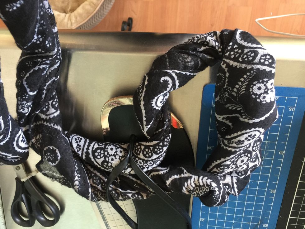 This is the right way to pull the scarf through